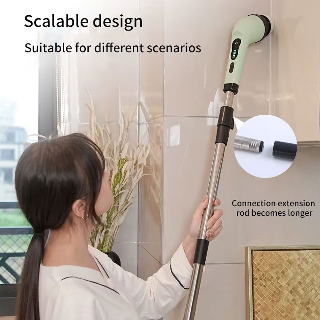 Person using a scalable cleaning tool with an extension rod in a bathroom setting.