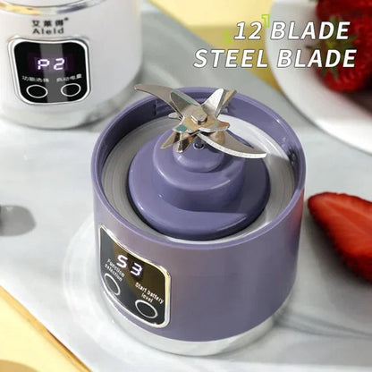 Purple blender with a steel blade on a white surface, surrounded by strawberries.