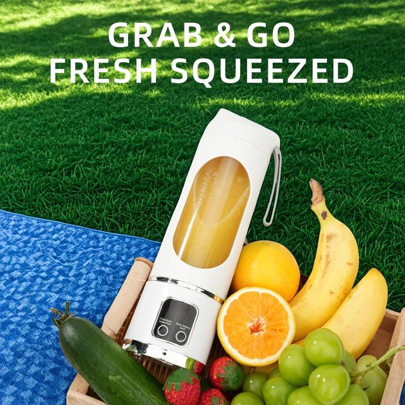 Portable blender with a smoothie and fruits on a grassy background with text 'Grab & Go Fresh Squeezed'.